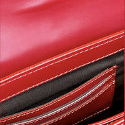 sac ethnique cuir rouge motifs Himba